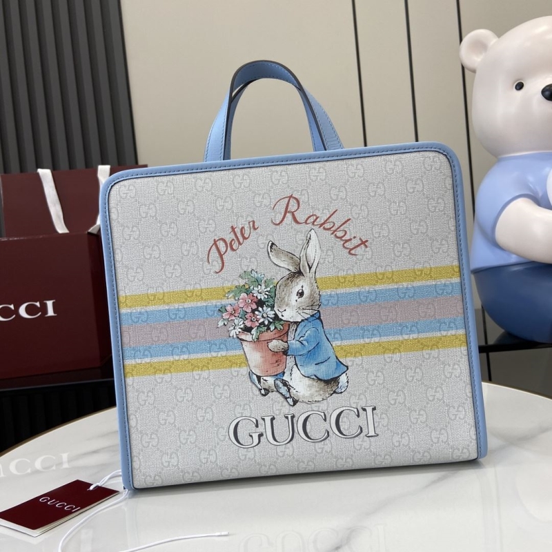 G*u*i shopping bags